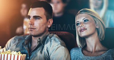 Buy stock photo Date, popcorn and couple at theater for watching movie, eating or romantic night together. Lens flare, evening and young woman with man in cinema with snack for entertainment, show or film premier