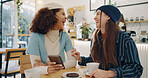 Girl, friends and phone in coffee shop with laugh, happy meeting and online connection for bonding at lunch. Comedy, smartphone and women in cafe with mobile app, funny chat or social media gossip