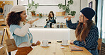 Girl, friends and fun hand shake in cafe for social meeting, connection and happy bonding at table. Smile, brunch and excited women in coffee shop together for morning drinks, discussion and reunion