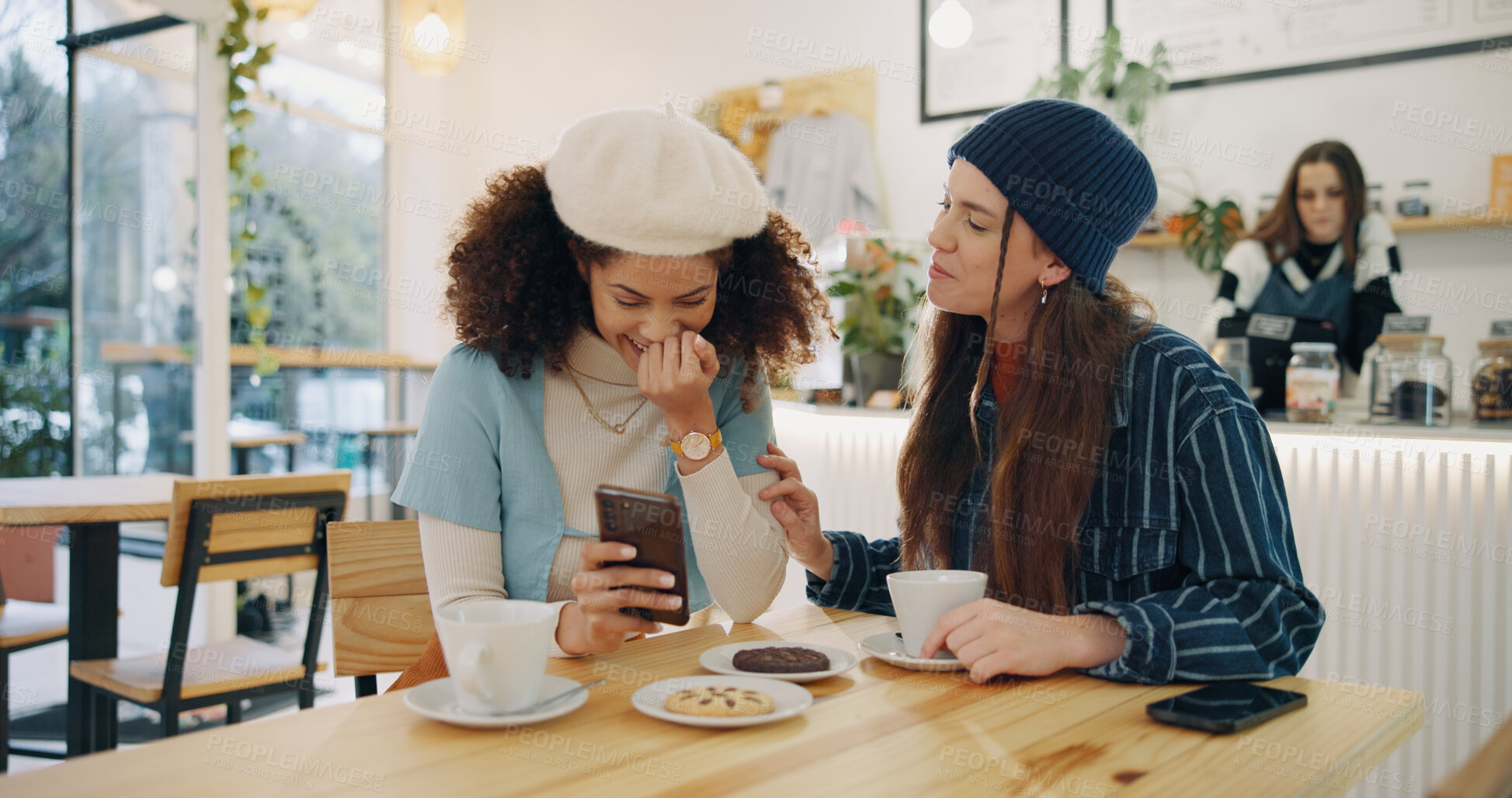 Buy stock photo Girl, friends and phone in cafe with laugh, happy gossip or online connection for bonding at lunch. Smile, smartphone and women in coffee shop together on mobile app, chat or funny social media post