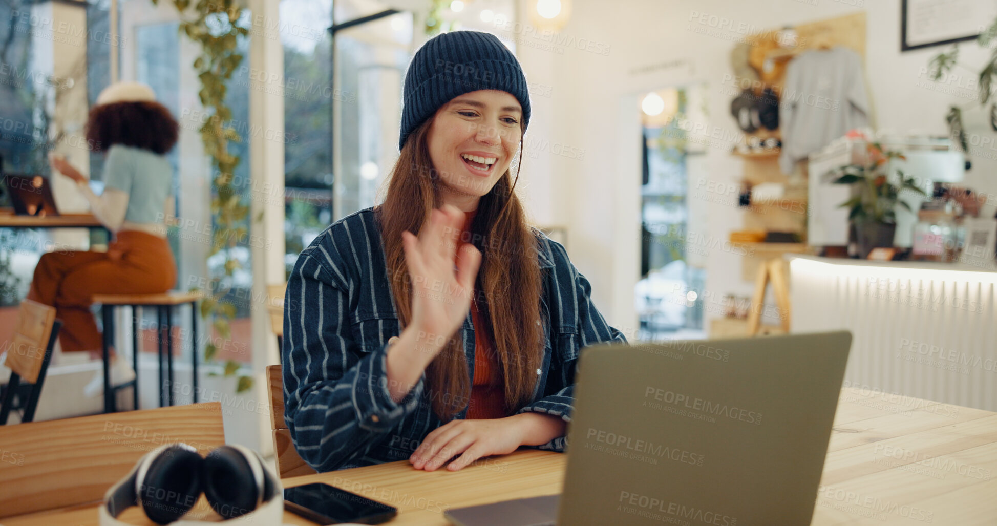 Buy stock photo Woman, video call and laptop in coffee shop for remote work, wave or happy with chat for freelance job. Person, smile and hello with communication, contact and talk on web for creative agency in cafe