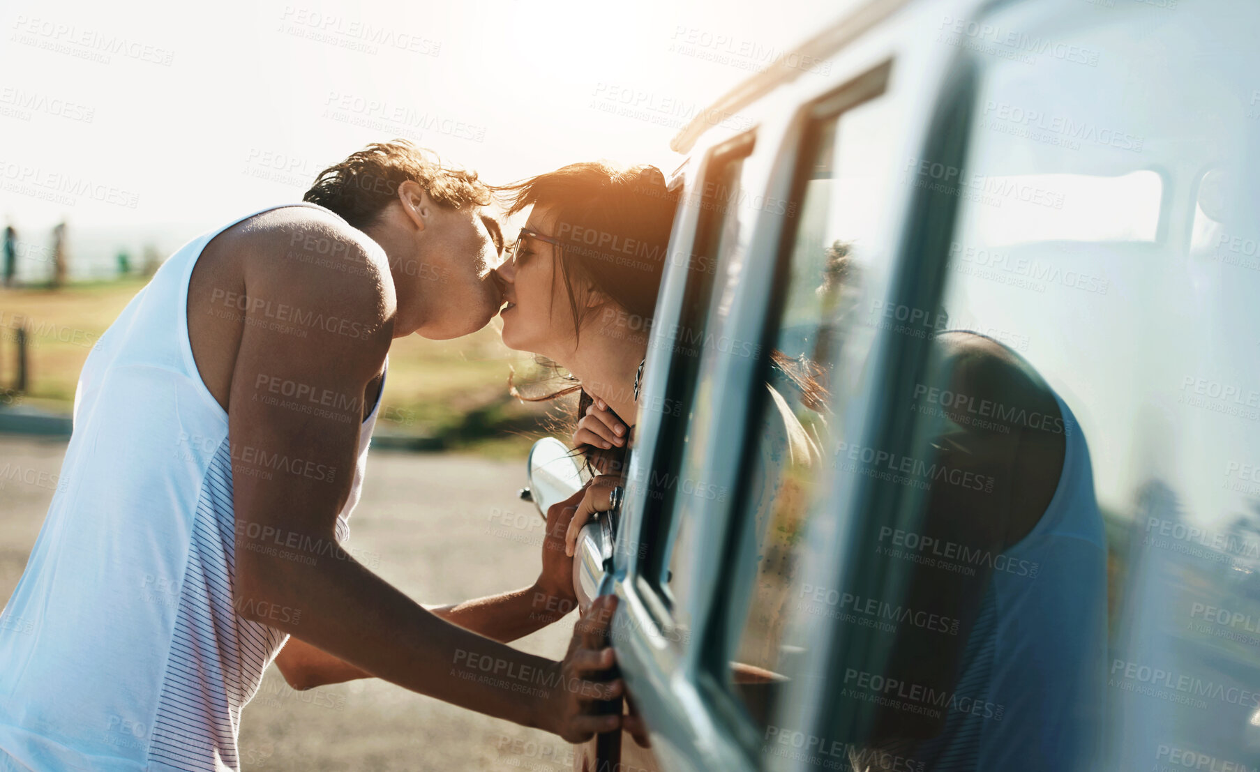 Buy stock photo Kiss, love and a couple on a road trip in a van for a holiday, adventure or a drive. Care, romantic and a man and woman kissing in nature with transportation for a honeymoon vacation or date