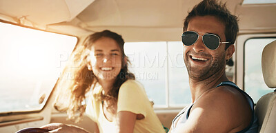 Buy stock photo Handsome male wearing glasses smiling and laughing with his girlfriend in the background