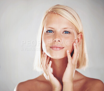 Buy stock photo Cosmetics, studio portrait and woman feeling, touch or check smooth skin texture, collagen filler results or skincare treatment. Dermatology self care, anti aging headshot or girl on white background