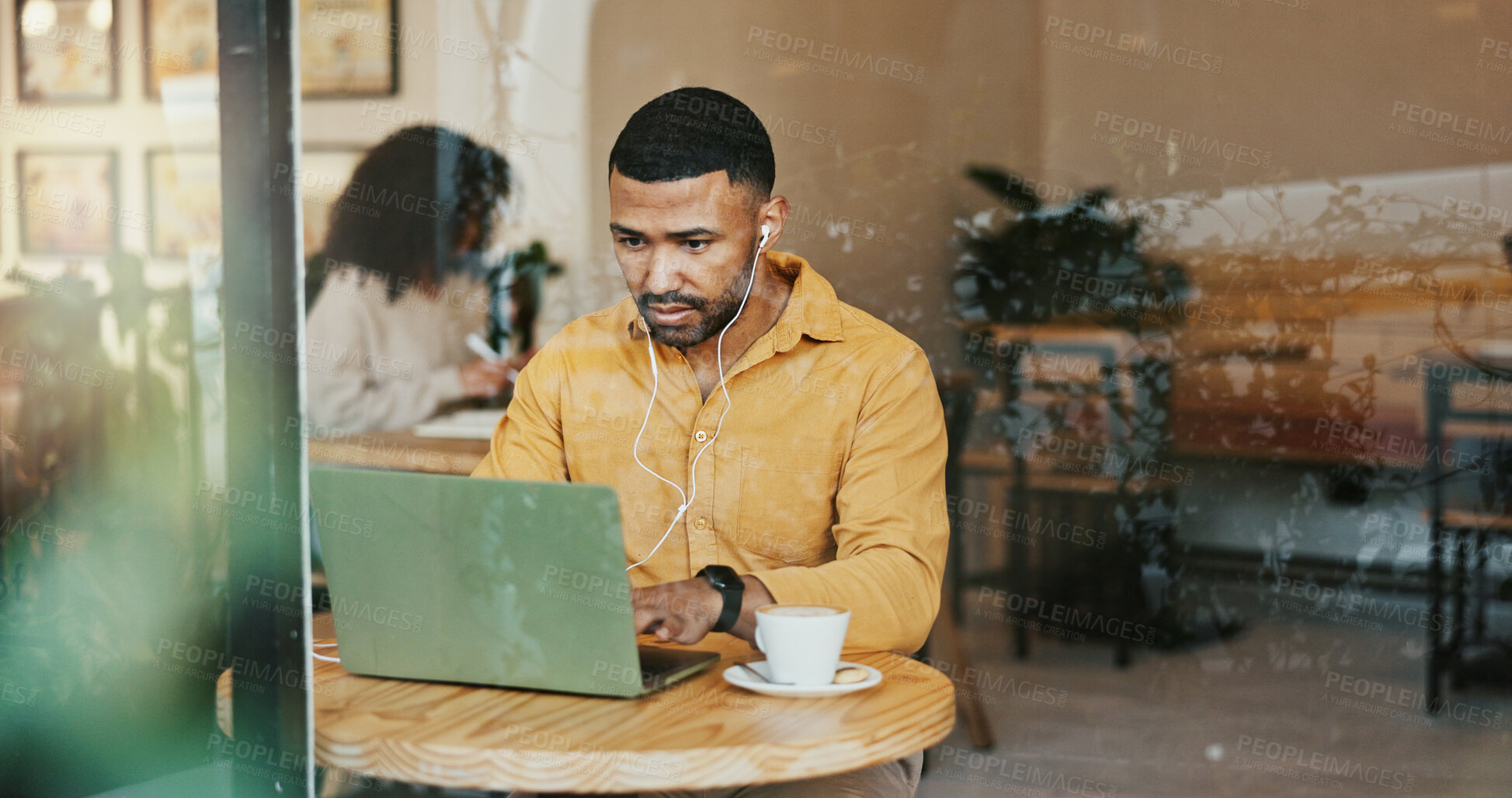 Buy stock photo Remote work, laptop and man in cafe, typing and live streaming with internet, research and tea. Person, copywriting and freelancer in coffee shop, computer and espresso with project and connection