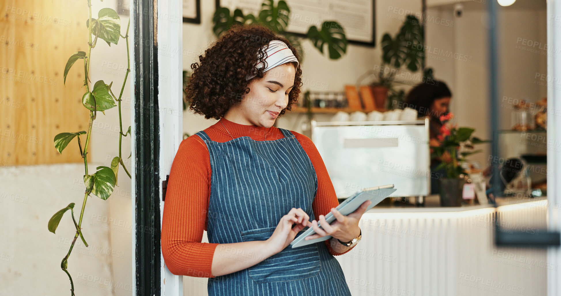 Buy stock photo Small business, woman and cafe or browsing tablet, happy employee and inventory or website order. Hospitality, coffee shop and doorway for customer service, waitress and restaurant with internet