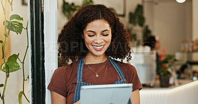 Buy stock photo Cafe, woman and smiling with browsing tablet, employee and online inventory for website order or review. Hospitality, coffee shop and doorway for customer service, waitress and restaurant with tech