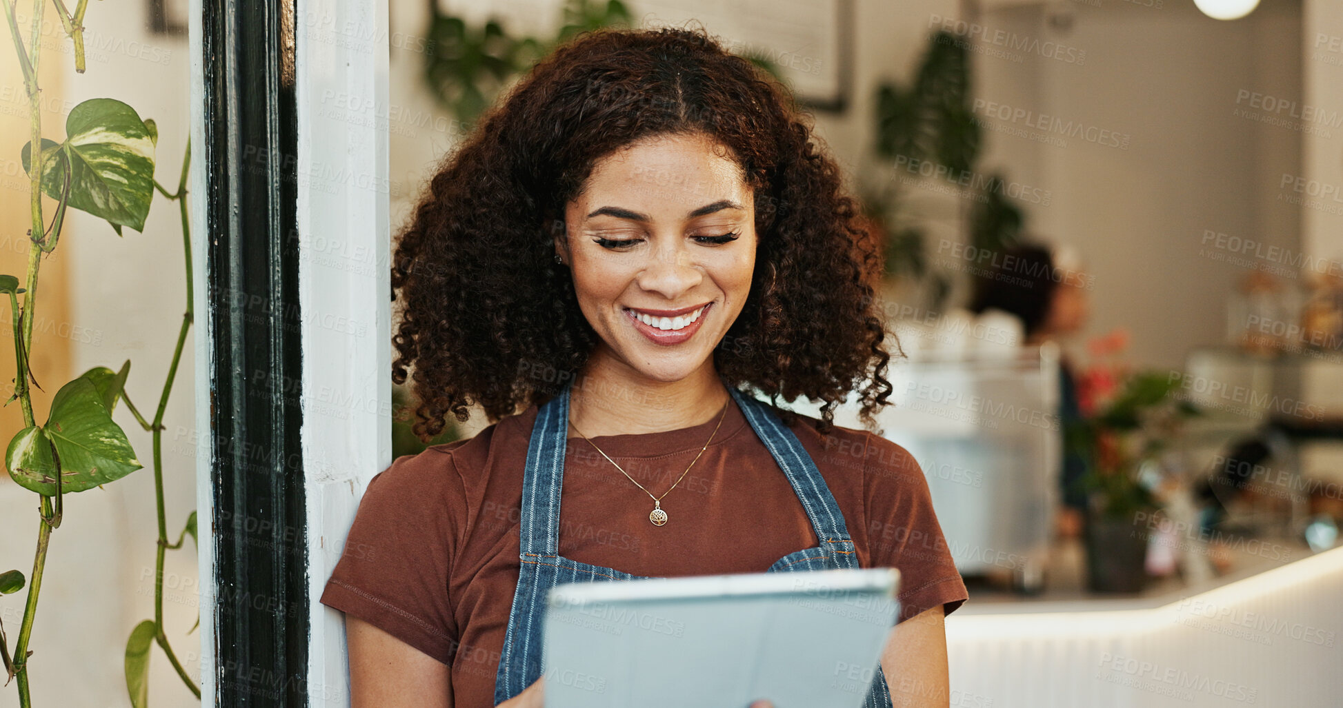 Buy stock photo Cafe, woman and smiling with browsing tablet, employee and online inventory for website order or review. Hospitality, coffee shop and doorway for customer service, waitress and restaurant with tech