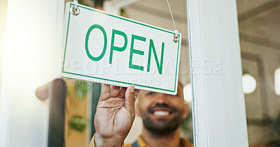 Buy stock photo Happy man, waiter and door with open sign for welcome or small business startup at indoor coffee shop. Male person, barista or employee with smile by entrance or ready for service at cafe restaurant