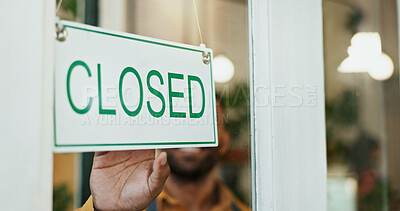 Buy stock photo Closed sign on window, small business and man with startup, poster and message for coffee shop. Person, employee and entrepreneur with board, information and fail with inflation, notice or bankruptcy