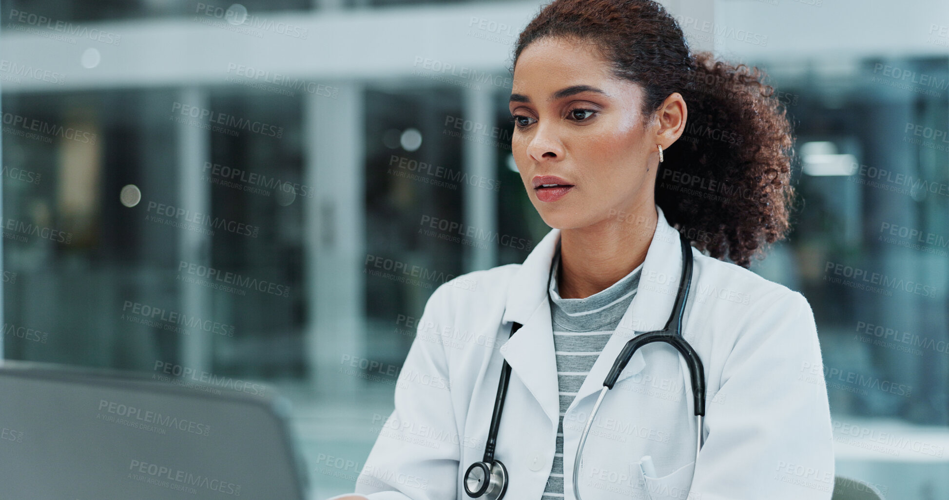 Buy stock photo Woman, doctor and online or reading in office for electronic health records, diagnostic research and clinical notes. Female medical worker, internet and serious in hospital for patient communication.