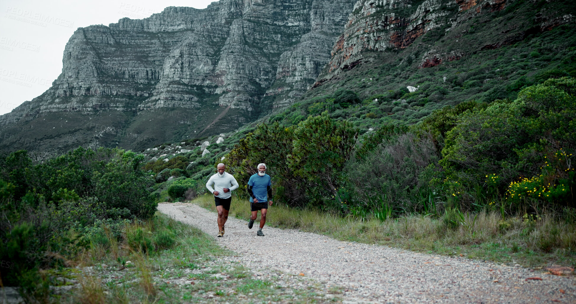 Buy stock photo Running, senior or black people in nature for fitness, health and wellness in retirement to exercise. Mountain, runners or friends on trail for body mobility workout, cardio performance and training