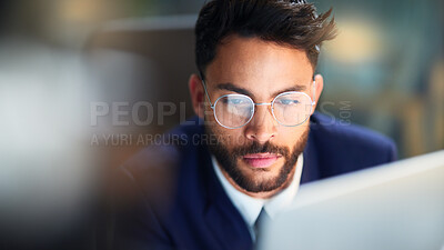 Buy stock photo Serious, night and man with glasses, laptop and test of software for cybersecurity, programmer and office. Workaholic, vision and employee for coding of website, IT and information technology in dark