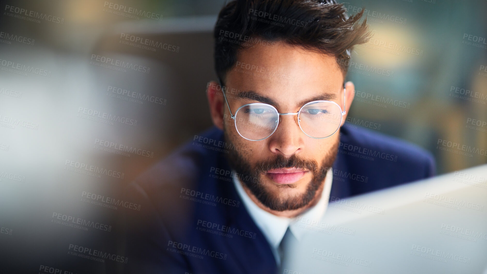 Buy stock photo Serious, night and man with glasses, laptop and test of software for cybersecurity, programmer and office. Workaholic, vision and employee for coding of website, IT and information technology in dark