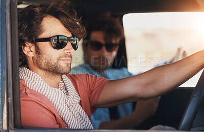 Buy stock photo Shot of a young man on a roadtrip