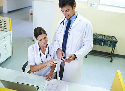 Buy stock photo Doctor, nurse and front desk in hospital on tablet, discussion and planning for patient schedule in clinic. Medical employees, healthcare service and people together, teamwork and professional
