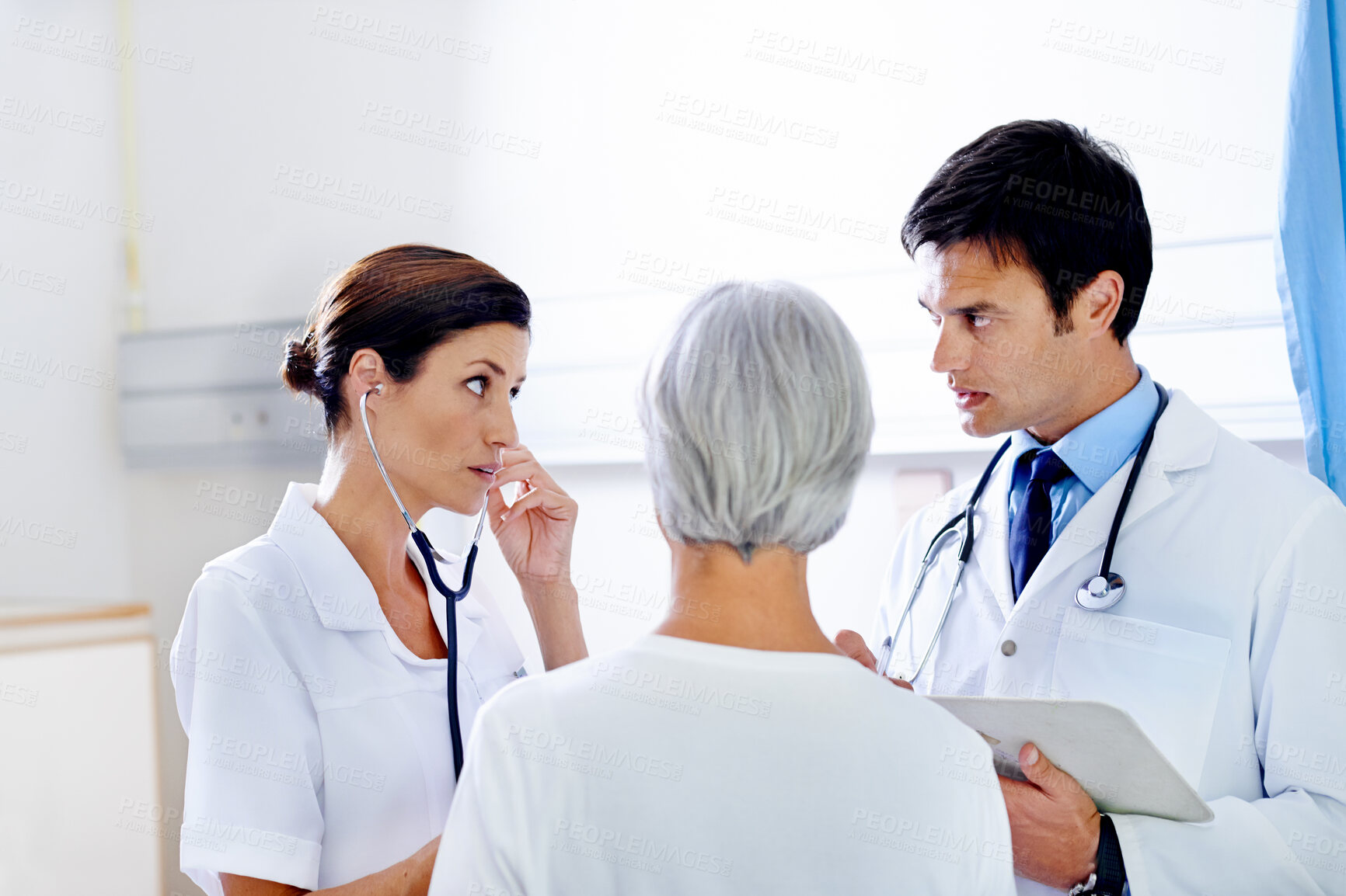 Buy stock photo Hospital, talking and doctor with old person, serious and medical employees with patient or conversation. Healthcare, wellness and nurse with discussion of care of elderly woman, illness or clipboard