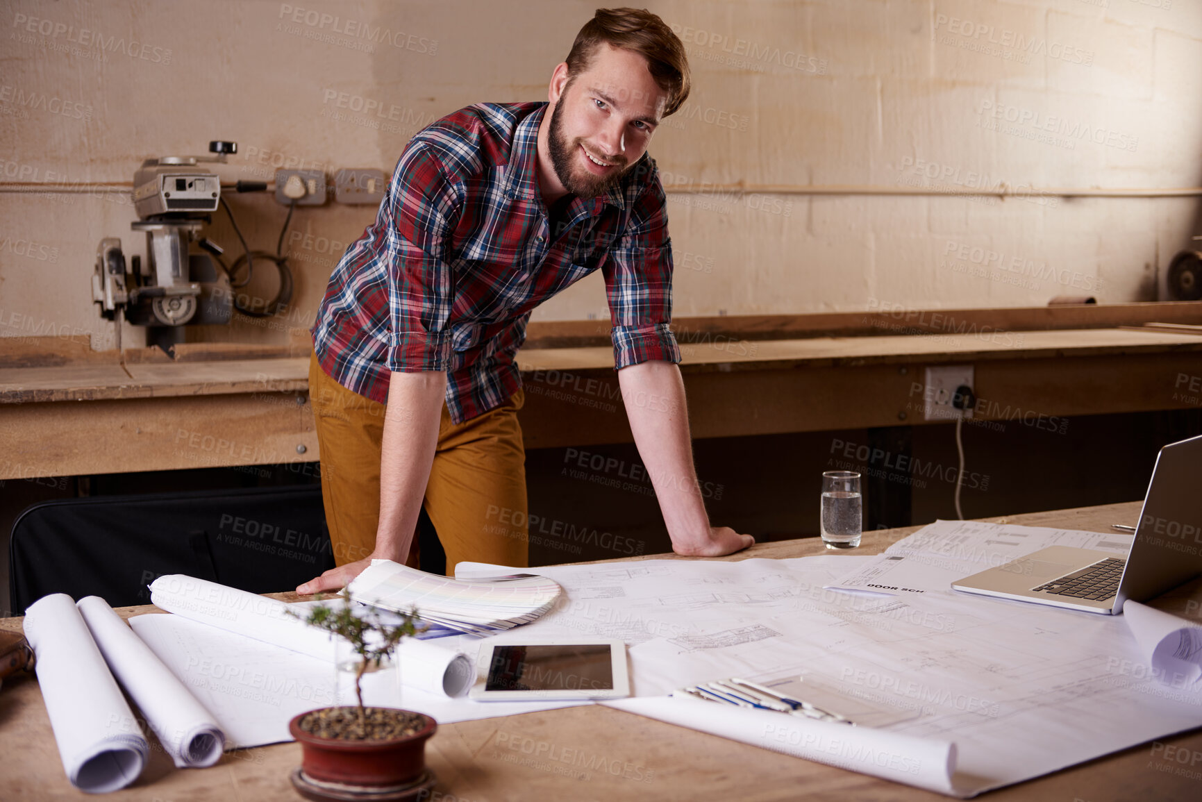 Buy stock photo Man, portrait and architect with blueprint for engineering or construction, renovation and design for building. Floor plan, sketch and property development with architecture paperwork in workshop