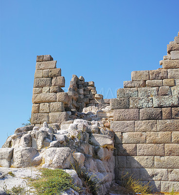 Buy stock photo Travel, destination and ancient architecture in Greece as temple, structure and old building at site. Landmark, monument and wall with tourism, culture and stone for discovery, adventure and history