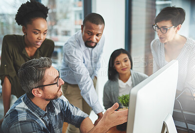 Buy stock photo Shot of businesspeople working together in the office 