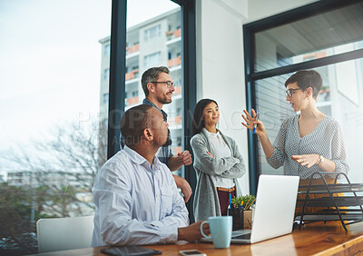 Buy stock photo Shot of businesspeople working together in the office 