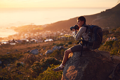 Buy stock photo Backpack, hiking and photography with man in mountains for adventure, hobby or travel outdoor. Break, scenic and view with confident hiker or photographer in nature for getaway, holiday or vacation