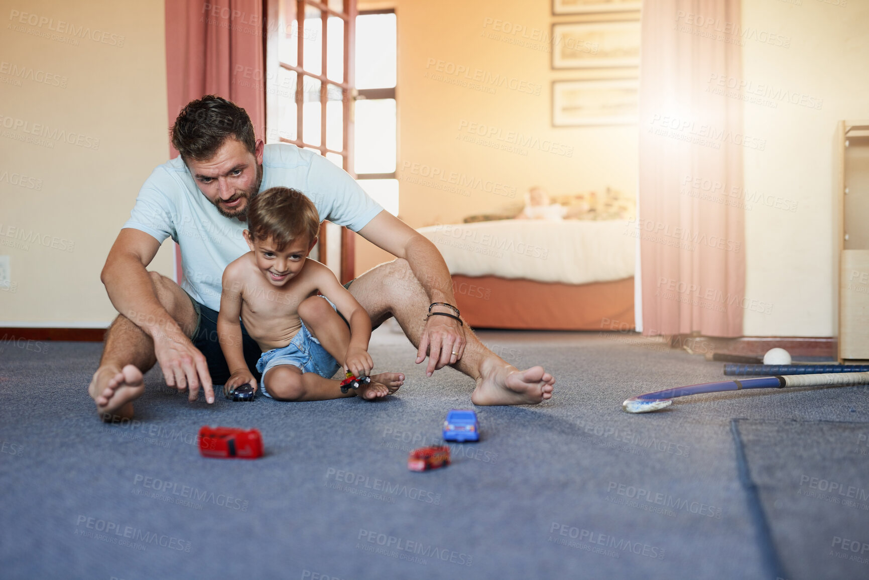 Buy stock photo Toy, car and man with child on floor for fun development, creativity and bonding together at home. Happy, father and son with game in bedroom for motor skills, cognitive and imagination on weekend