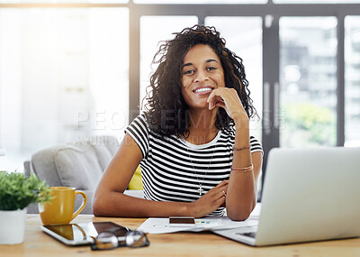 Buy stock photo Shot of a young woman working from home