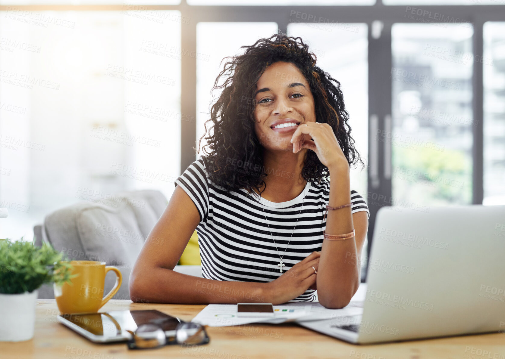 Buy stock photo Shot of a young woman working from home