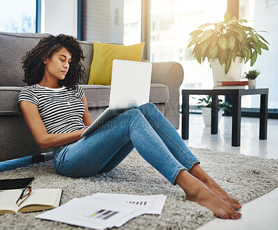 Buy stock photo Remote work, woman or student with laptop and paper on floor for distance learning or online course at home. Reading, female person and computer for education, studying and planning biology essay