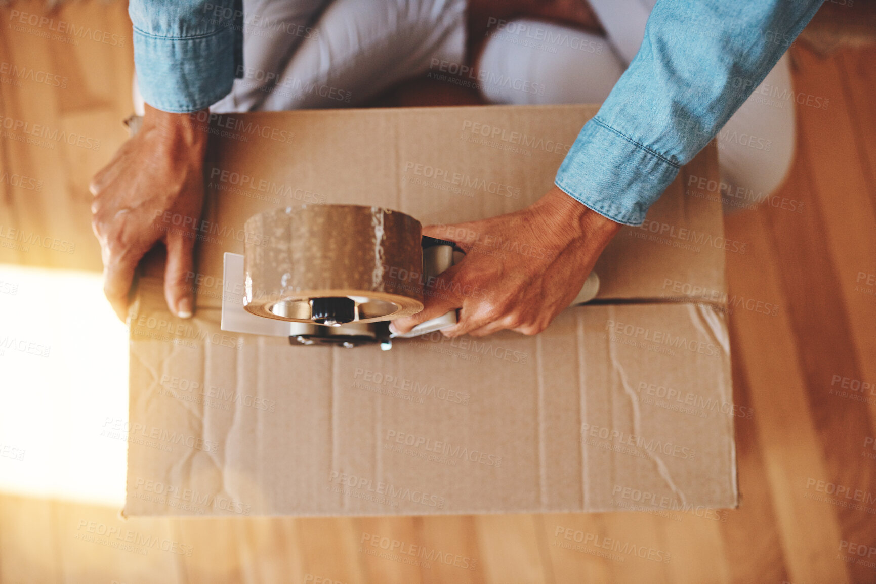 Buy stock photo Hands, box and tape in house for moving with package, seal or ready for immigration on floor. Person, cardboard container and relocation for fresh start, property or investing in real estate in Spain