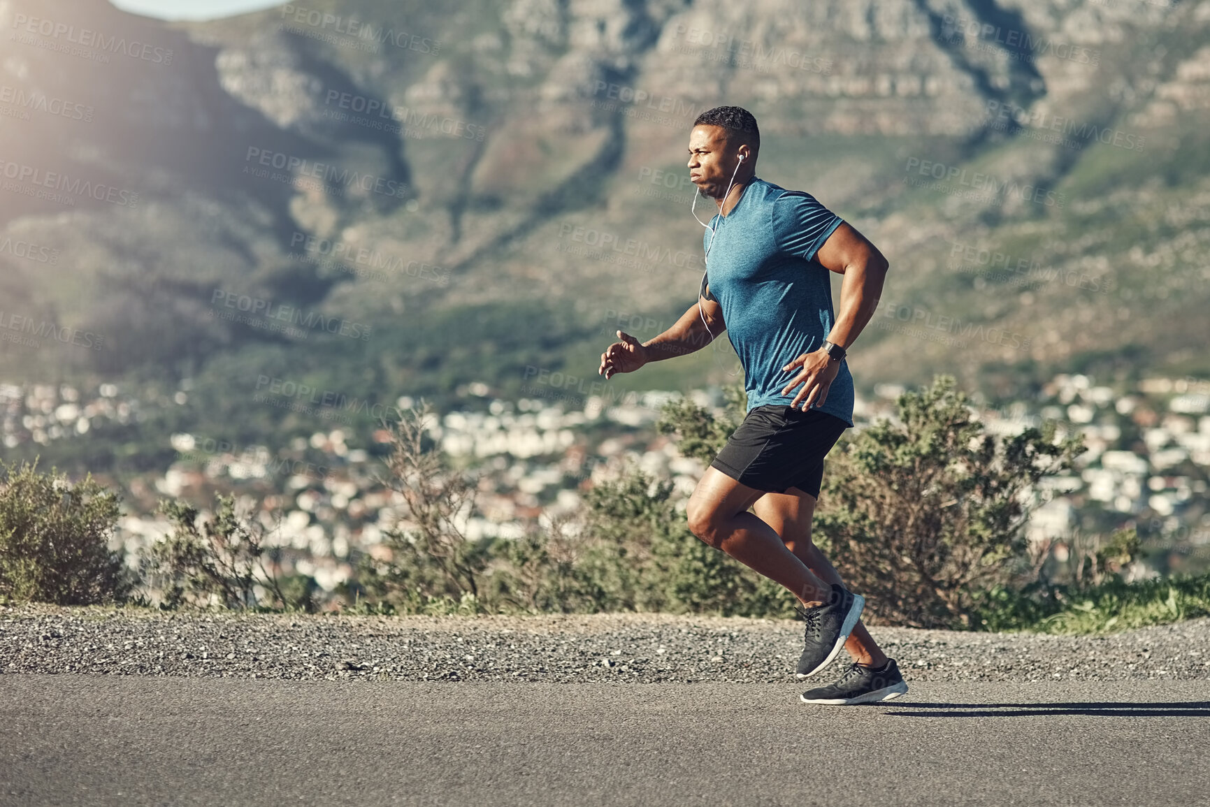 Buy stock photo Black man, running and mountain with workout, exercise and road or training for future sports competition. Athlete, jog and outdoor for fitness, health and performance with stopwatch or music