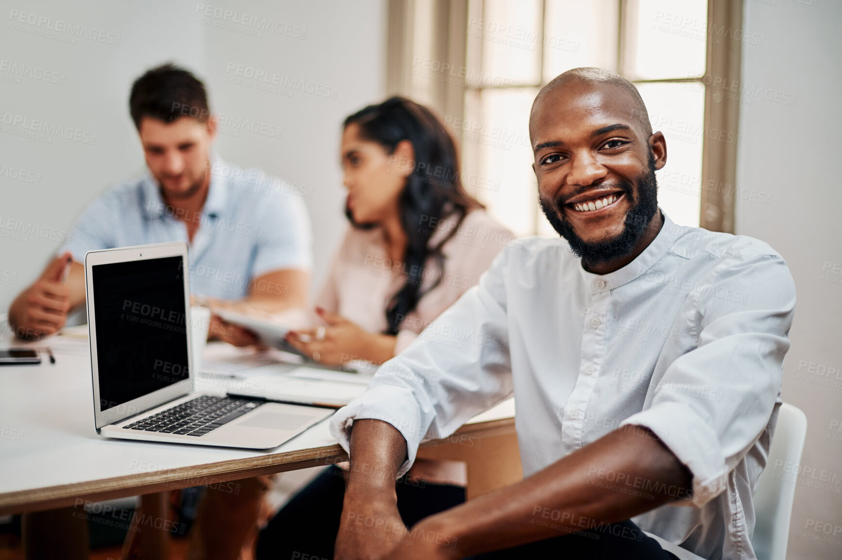 Buy stock photo Portrait, businessman and happy with laptop, meeting and mentorship for team or colleagues in office. Male person, smile and tech as web designer, employee and professional for brief or brainstorming