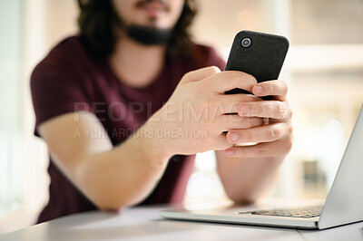 Buy stock photo Businessman, hands and typing with phone by laptop for communication, news or research at office. Closeup of man, employee or user scrolling or texting on mobile smartphone for online chatting or app