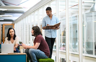 Buy stock photo Talking, business people and laptop with notes in office, planning and online research for startup. Teamwork, employees and digital with tech for information, discussion and prepare for presentation