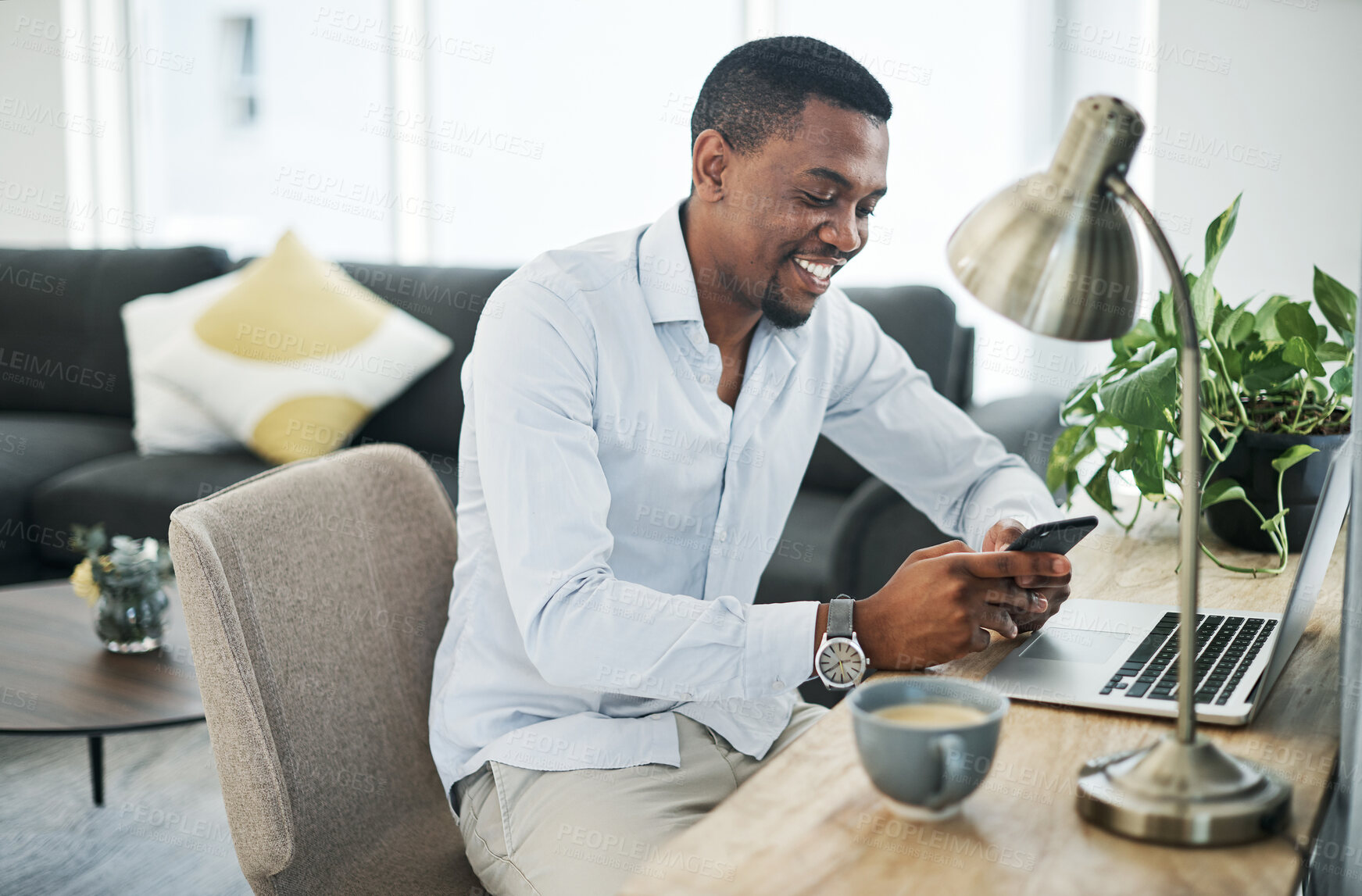 Buy stock photo Black man, phone and happy in house for remote work, communication and business email with coffee. Human resources, technology and smile for freelance job, social networking and talent acquisition