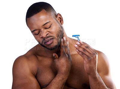 Buy stock photo Black man, shaving and hair removal pain in studio, injury and cosmetics fail on white background. Male person, steel and grooming or skincare mistake, facial treatment accident and blade to clean