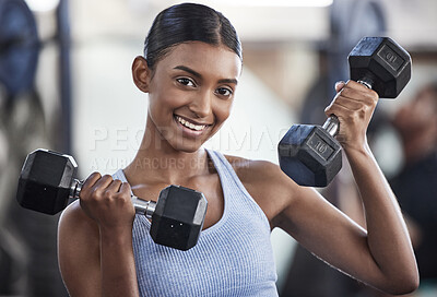 Buy stock photo Portrait of woman in gym, dumbbell and smile for weightlifting, power and muscle at sports club. Balance, fitness and female bodybuilder holding weights and training with health goals and happiness.