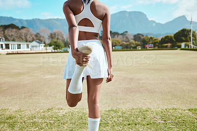 Buy stock photo Woman, stretching leg and outdoor fitness on field, warm up and netball player for preparation. Person, back and exercise for flexibility or muscle relief, athlete and getting ready for training