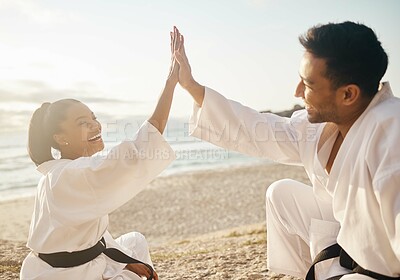 Buy stock photo Beach, karate and friends with high five, training and fitness with achievement, success and practice. Motivation, outdoor and ocean with man, woman and hand gesture with exercise and martial arts