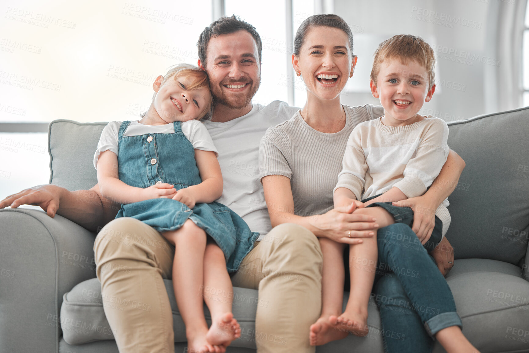 Buy stock photo Couch, parents and children in portrait for love, connection and bonding together in family home. House, mother and father with siblings for security, care and embrace relationship with smile in sofa