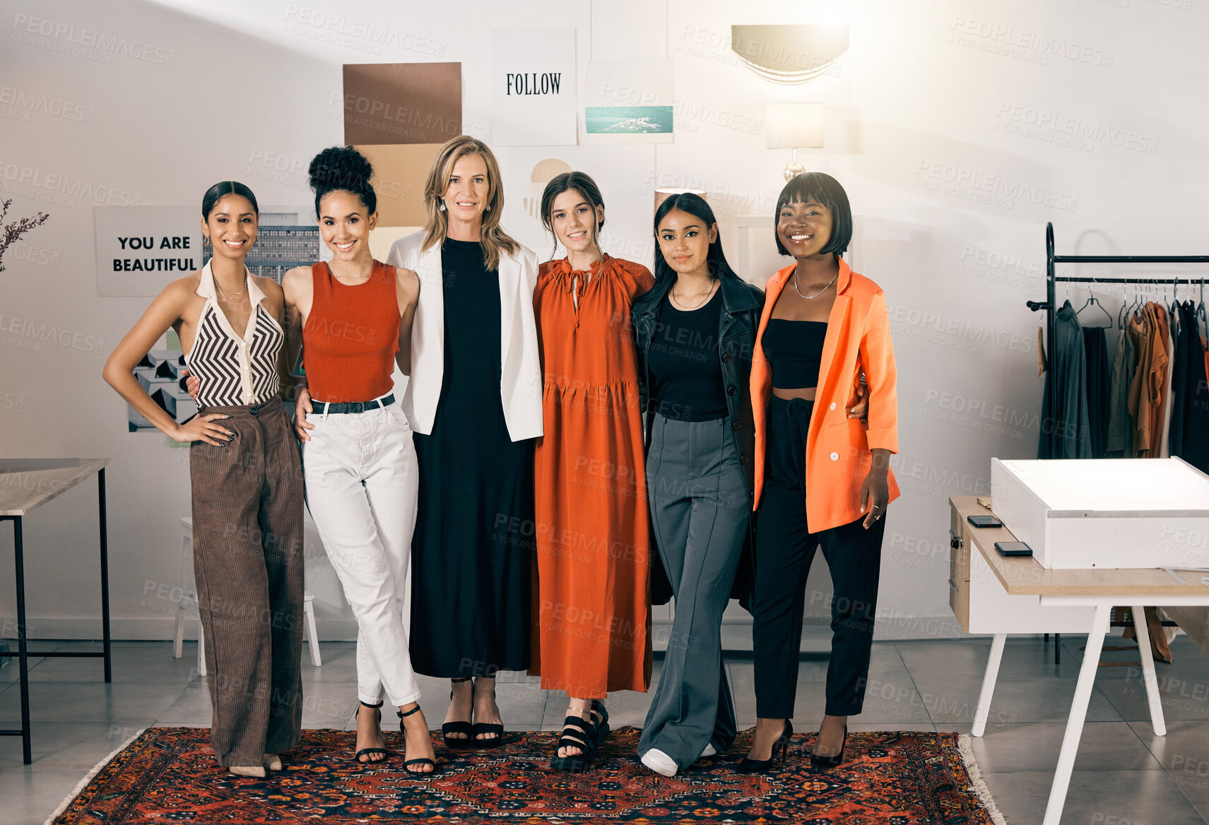 Buy stock photo Shot of a group of businesswoman standing in an office at work