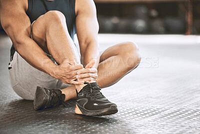 Buy stock photo Bodybuilder, ankle and man in gym, pain and sports injury with bruise, broken and inflammation. Person, closeup and athlete with workout, training and orthopaedic health problem with physical therapy