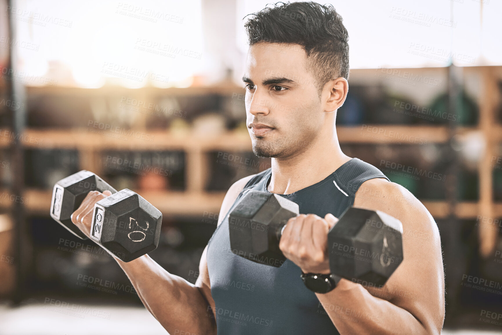 Buy stock photo Fitness, dumbbell workout and man at gym for weight training, health or exercise at sports center. Bodybuilder, arm muscle and strength for cardio, wellness and power lift or development goals