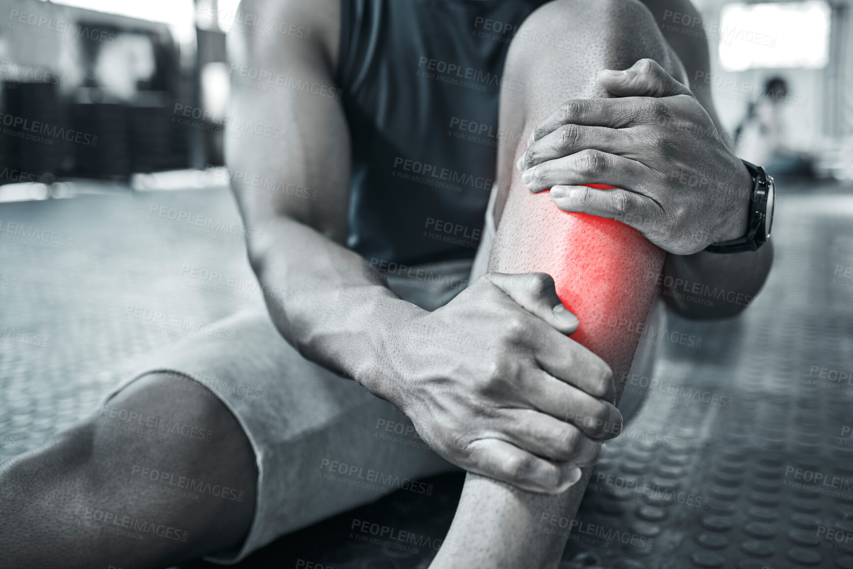 Buy stock photo Fitness, injury and leg pain with person on floor of gym for accident, fail or mistake in black and white. Anatomy, emergency and inflammation with red highlight on shin of hurt athlete in grayscale