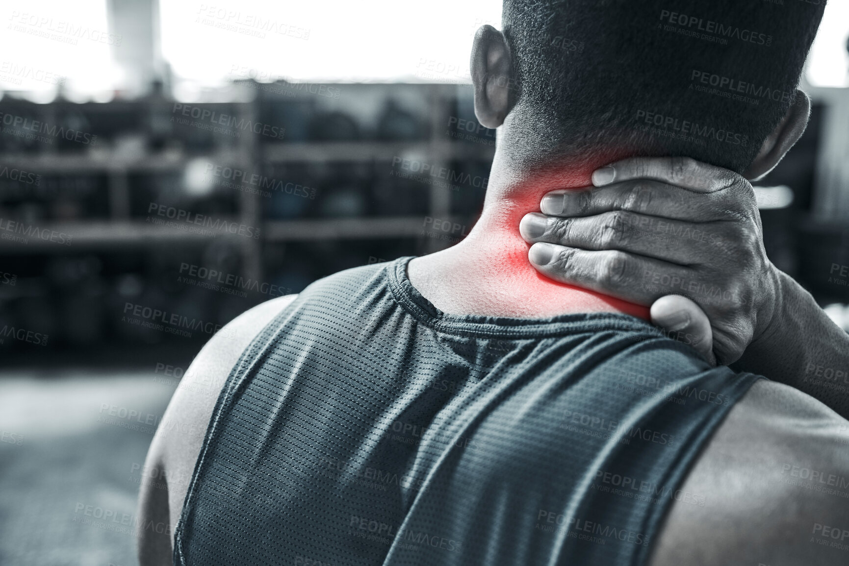 Buy stock photo Man, fitness and neck pain with red glow at gym with muscle tension and strain. Male person, workout and exercise with ache, injury and inflammation on training or warm up for health and wellness