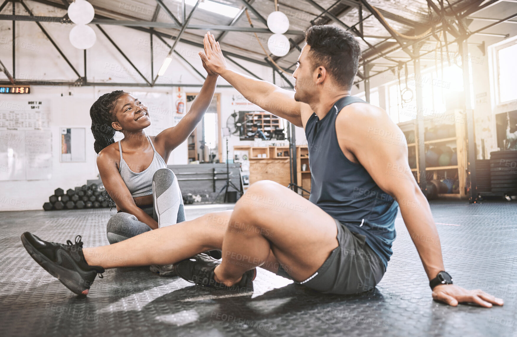 Buy stock photo High five, sports and team of athletes in gym with achievement, challenge or training together. Happy, celebration and young man and woman cheering for workout partnership goals in fitness center.