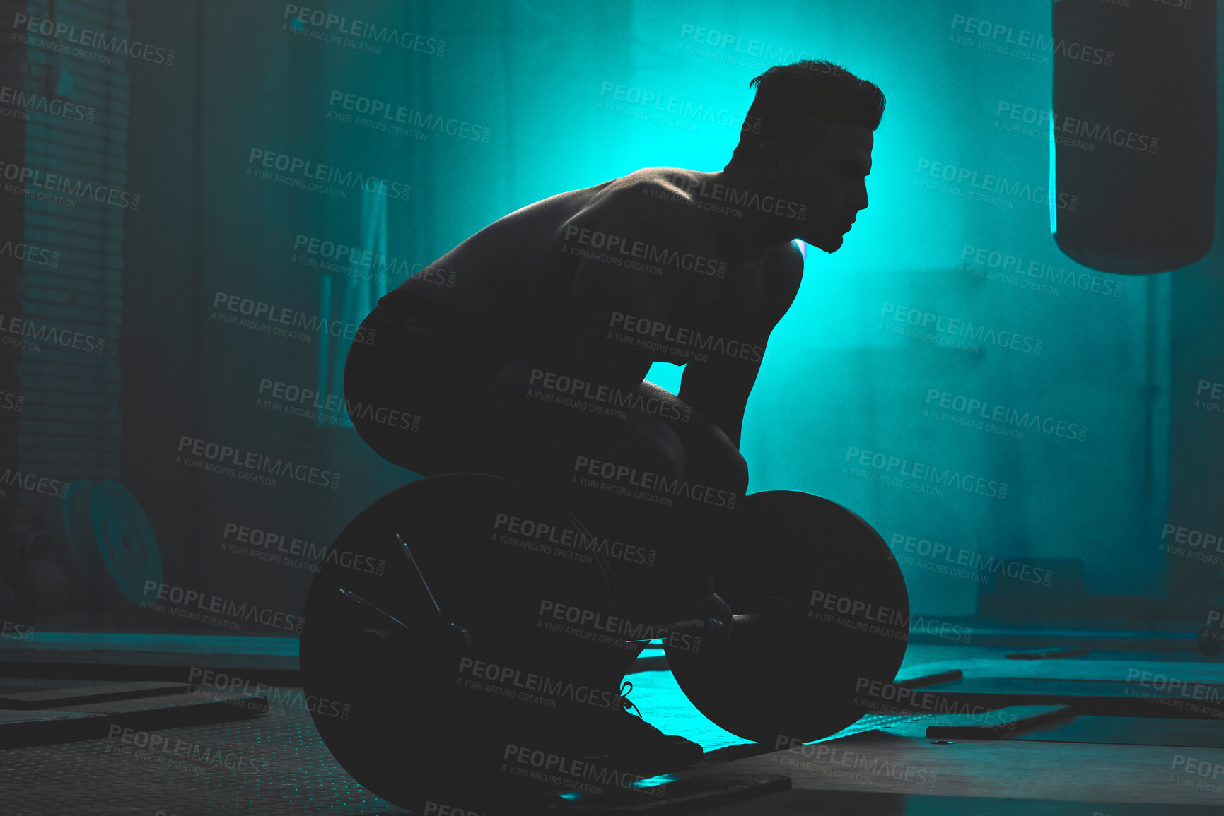 Buy stock photo Silhouette, man and weightlifting with barbell for workout, exercise or training in fitness at gym. Active male person or bodybuilder lifting bar for muscle gain, strength or practice at health club