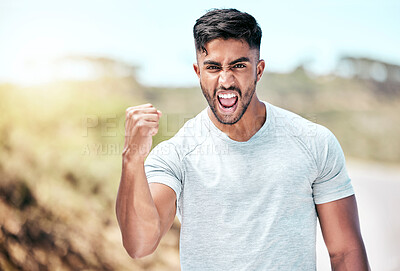 Buy stock photo Portrait, fist pump and man with smile, fitness and proud of muscle, outdoor and runner in nature for victory. Confident, goal and wellness of athlete, excited or training of person with celebration