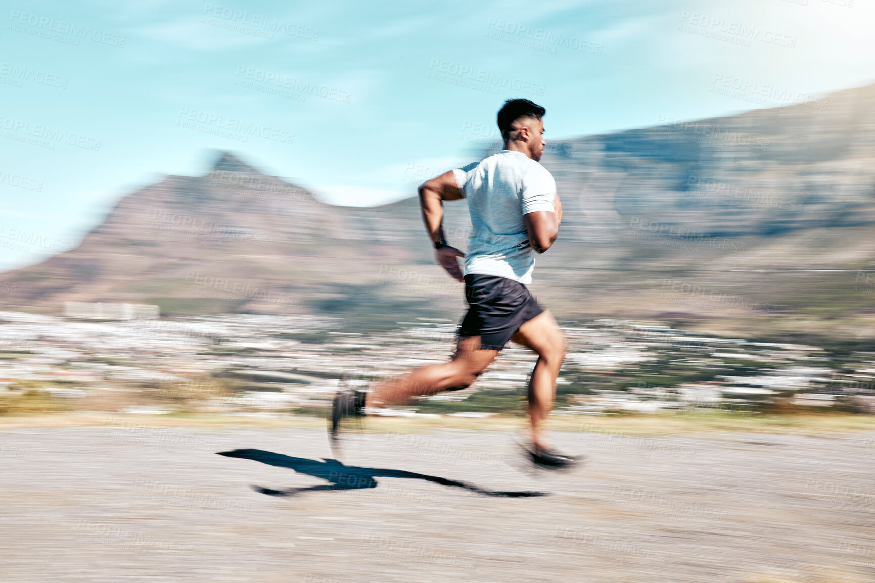 Buy stock photo Outdoor, man and running for fitness on road with exercise, training and workout in Brazil. Male person, motion blur and jogging or race for wellness, wellbeing and self care or health as athlete